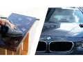 Polering av en epoxytablett och en mörk BMW med en trasa. För en glansig finish, använd Turtle Wax Carnauba.
