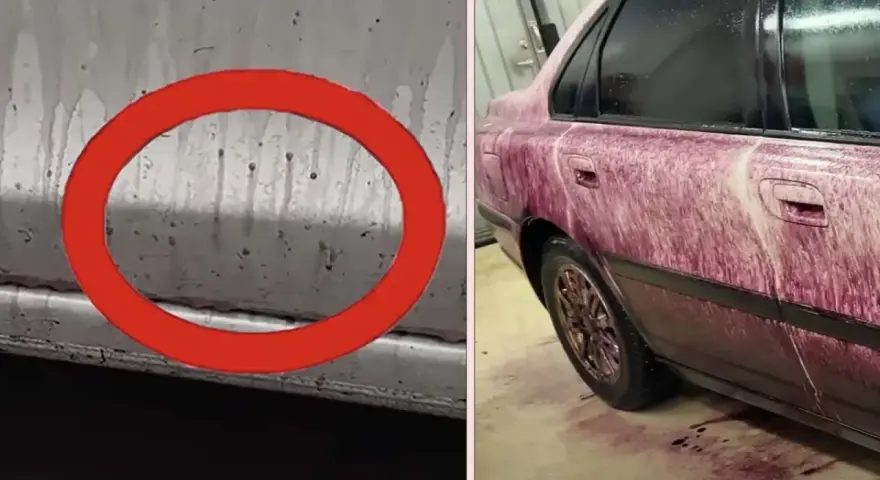 Bilens sida täckt av lila vätska, en flygrostlösare som visar sin effekt.